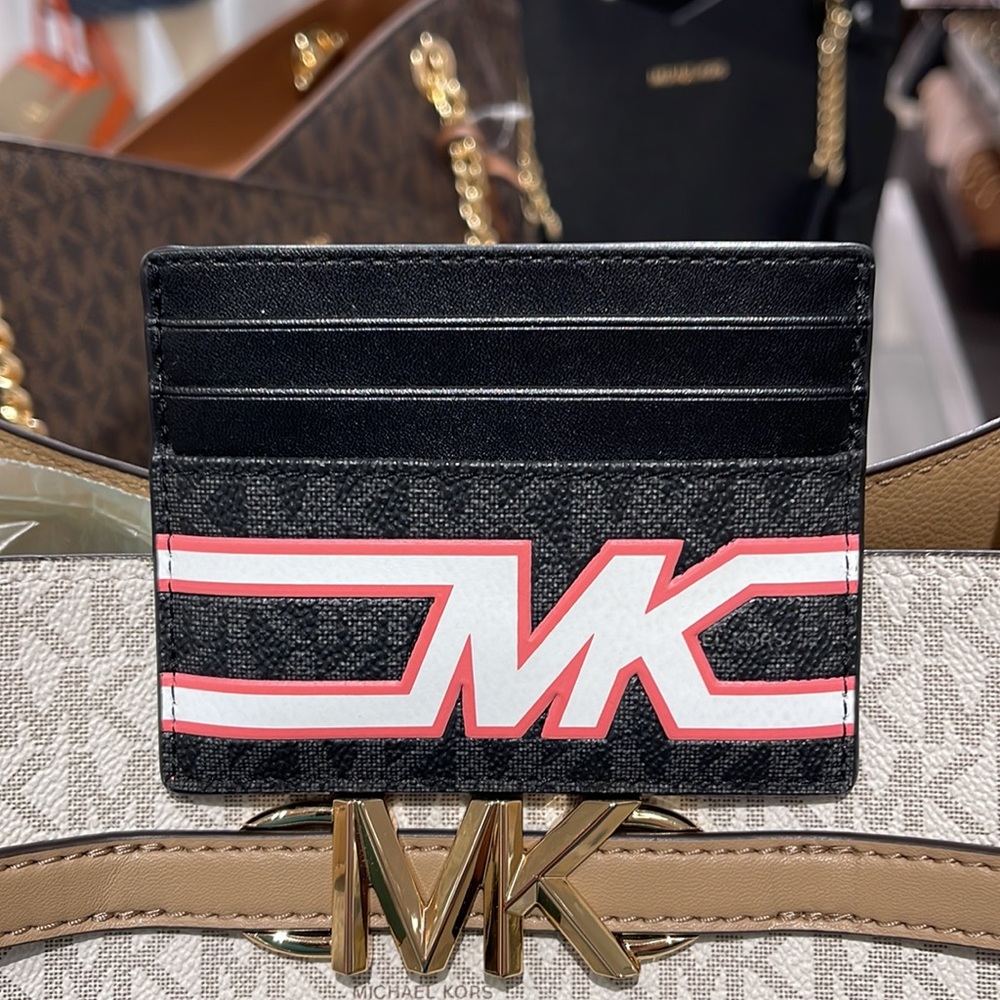 MICHAEL KORS MENS
Cooper Graphic Logo Tall Card Case
Style# 36S3LCOD2B
PINK 
NWT - Picture 9 of 16